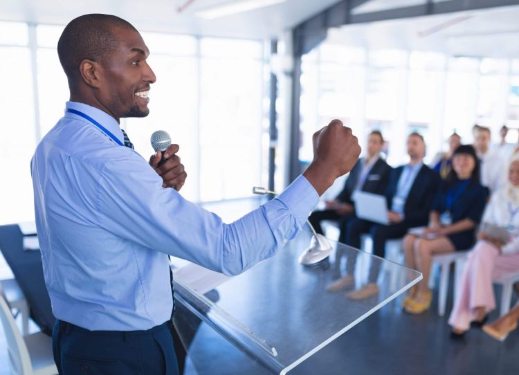 Male speaker speaks in business seminar